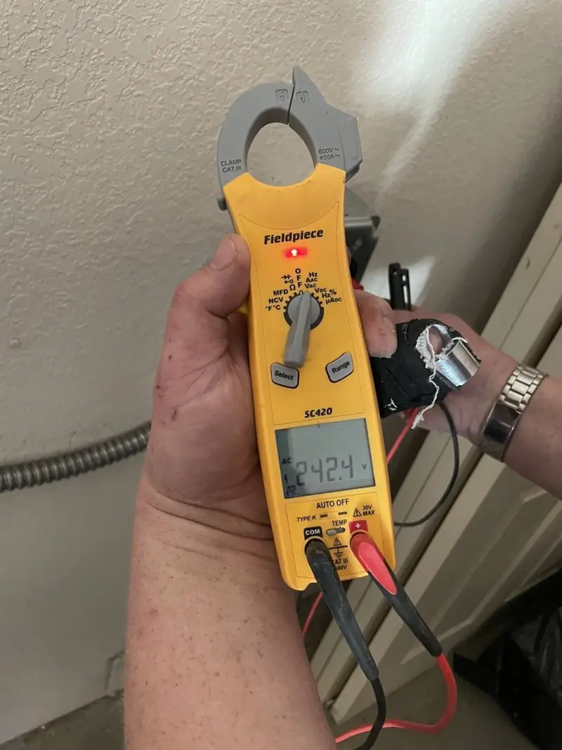 Voltage testing with clamp meter during Electrical Installation Services in Desert Hills